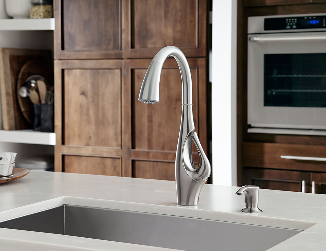 A statuesque neck, elegant curves, and a distinctly artful silhouette make the Indira faucet a unique kitchen statement like no other.